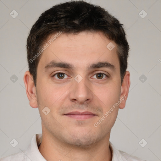 Joyful white young-adult male with short  brown hair and brown eyes