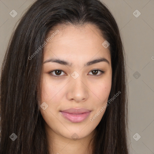 Joyful asian young-adult female with long  brown hair and brown eyes