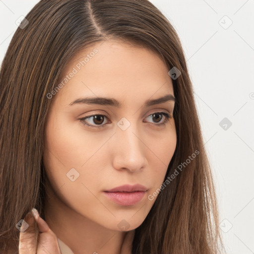 Neutral white young-adult female with long  brown hair and brown eyes