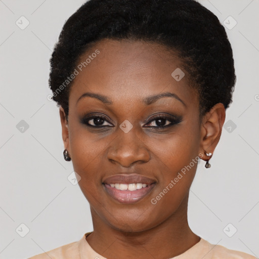 Joyful black young-adult female with short  black hair and brown eyes