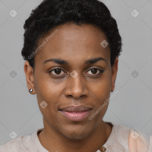 Joyful black young-adult female with short  black hair and brown eyes