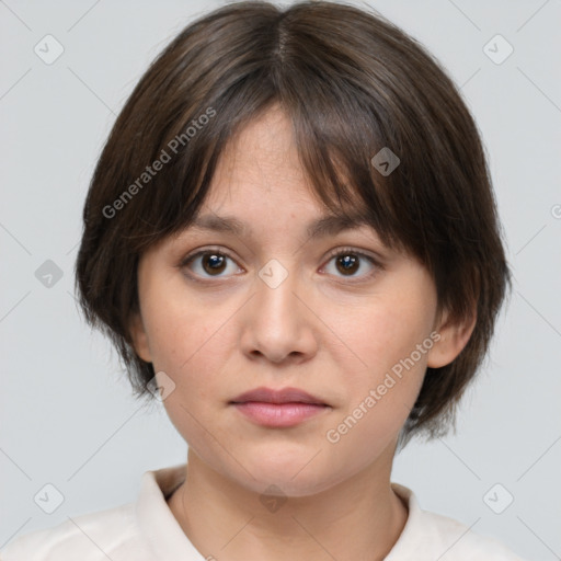 Neutral white young-adult female with medium  brown hair and brown eyes