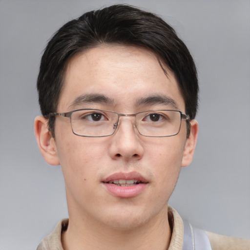 Neutral asian young-adult male with short  brown hair and brown eyes