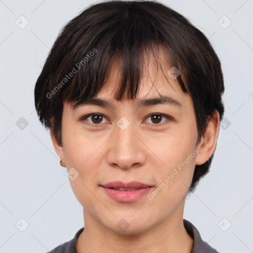 Joyful white adult female with short  brown hair and brown eyes