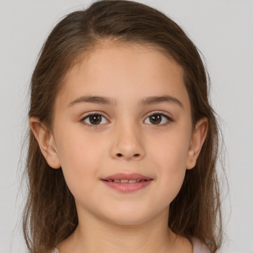 Joyful white child female with medium  brown hair and brown eyes