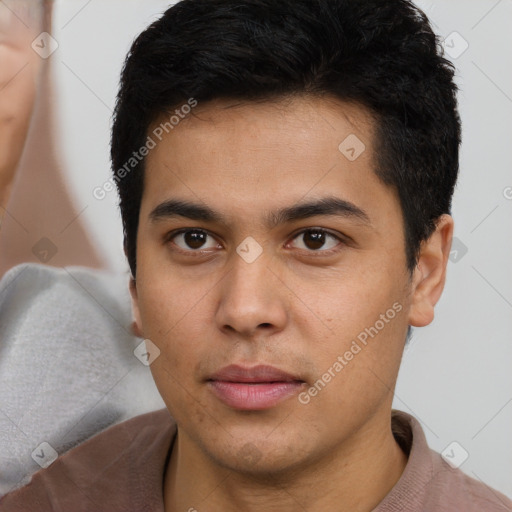 Neutral latino young-adult male with short  brown hair and brown eyes