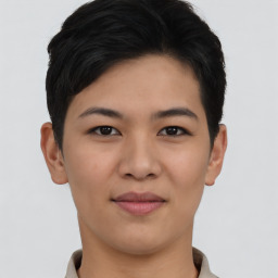 Joyful asian young-adult female with short  brown hair and brown eyes