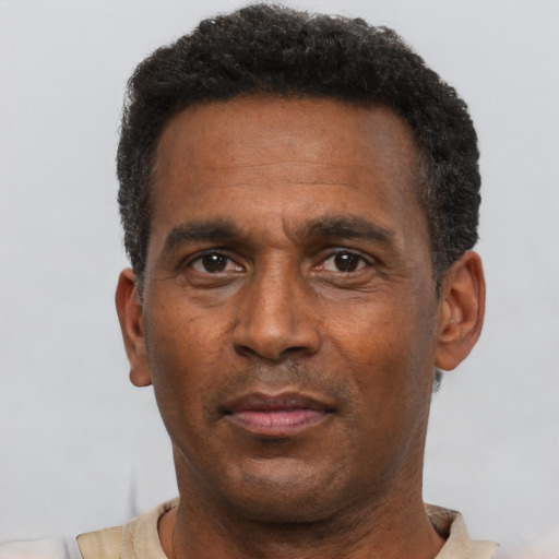 Neutral black adult male with short  black hair and brown eyes