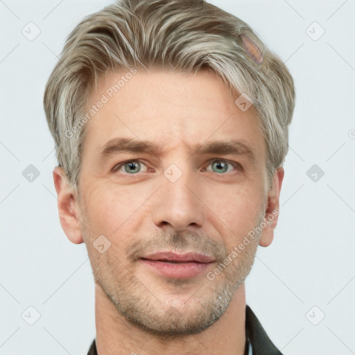 Neutral white adult male with short  brown hair and grey eyes