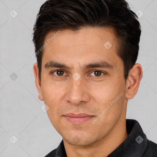 Joyful white adult male with short  brown hair and brown eyes