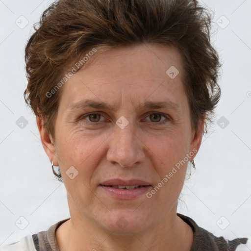 Joyful white adult female with short  brown hair and brown eyes