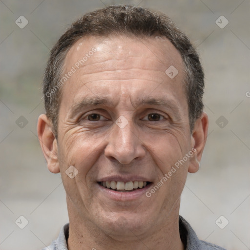 Joyful white middle-aged male with short  brown hair and brown eyes