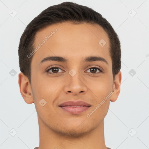 Joyful latino young-adult male with short  brown hair and brown eyes