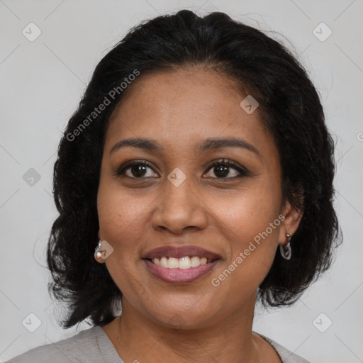 Joyful black young-adult female with medium  brown hair and brown eyes