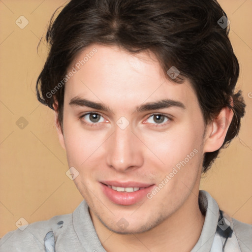 Joyful white young-adult male with medium  brown hair and brown eyes