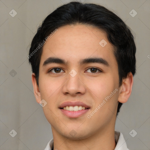 Joyful asian young-adult male with short  black hair and brown eyes