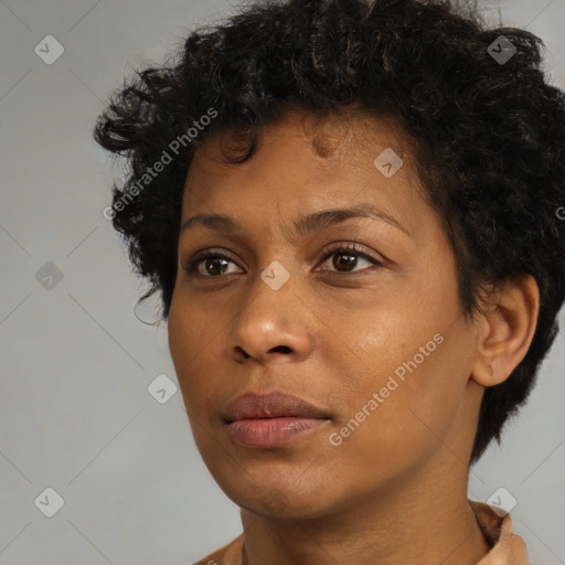 Neutral black young-adult female with short  brown hair and brown eyes