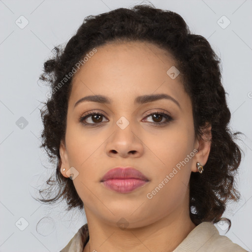 Neutral black young-adult female with medium  brown hair and brown eyes