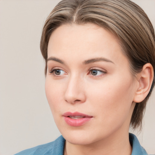 Neutral white young-adult female with medium  brown hair and grey eyes