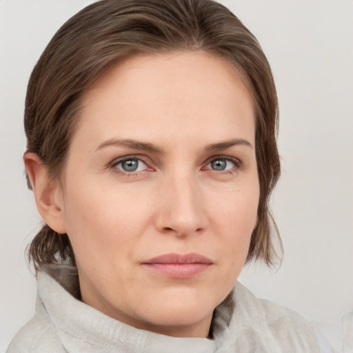 Neutral white young-adult female with medium  brown hair and grey eyes