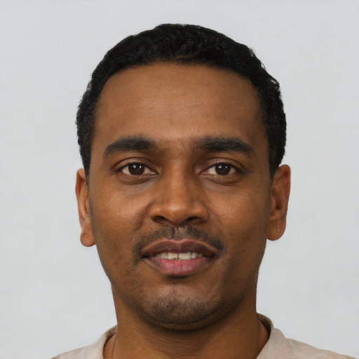Neutral black young-adult male with short  black hair and brown eyes