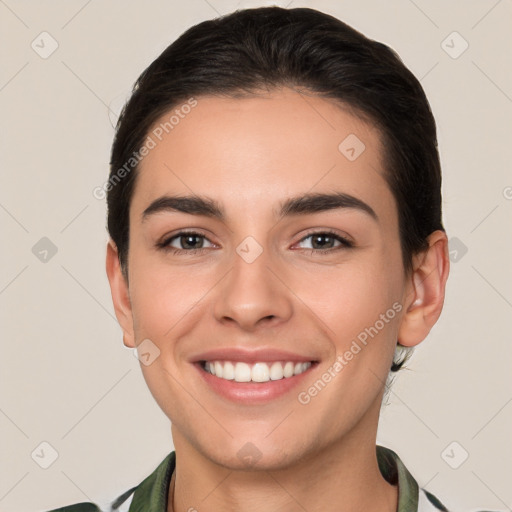 Joyful white young-adult female with medium  brown hair and brown eyes