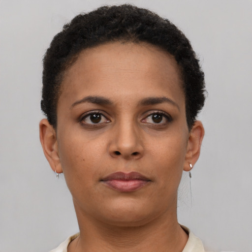 Neutral black young-adult female with short  brown hair and brown eyes