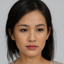 Neutral asian young-adult female with medium  brown hair and brown eyes
