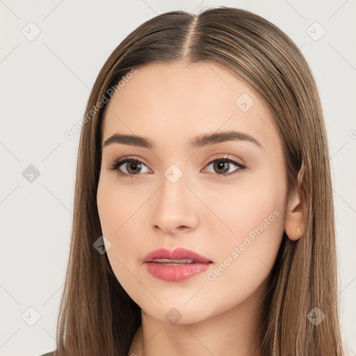 Neutral white young-adult female with long  brown hair and brown eyes