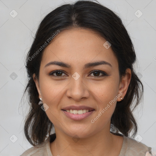 Joyful latino young-adult female with medium  brown hair and brown eyes