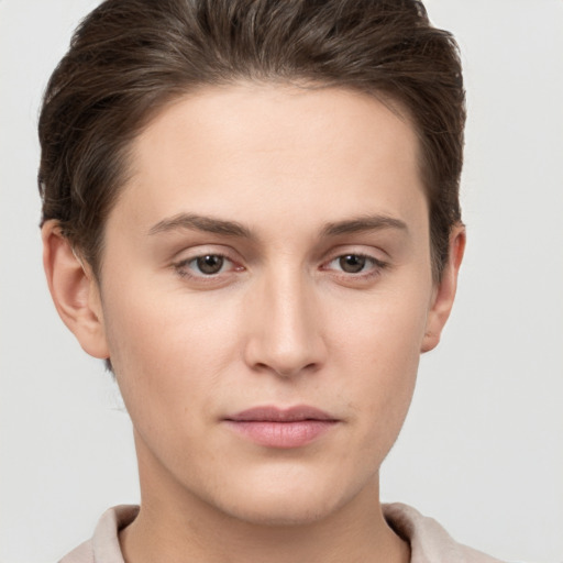 Neutral white young-adult female with short  brown hair and brown eyes