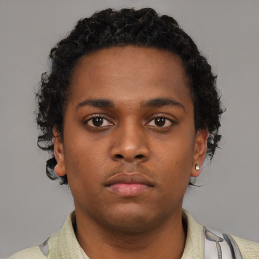 Neutral black young-adult male with short  brown hair and brown eyes