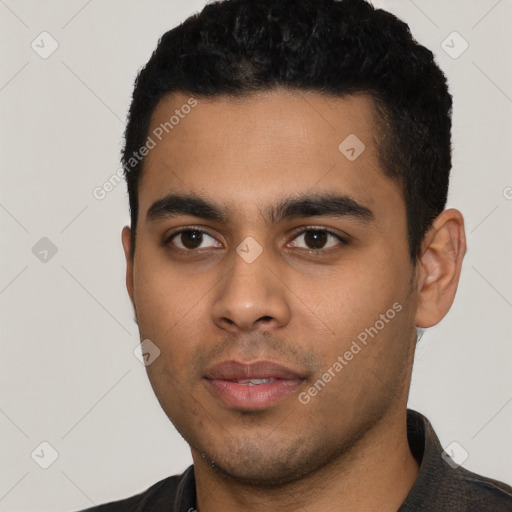 Neutral latino young-adult male with short  black hair and brown eyes