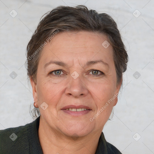 Joyful white adult female with short  brown hair and brown eyes