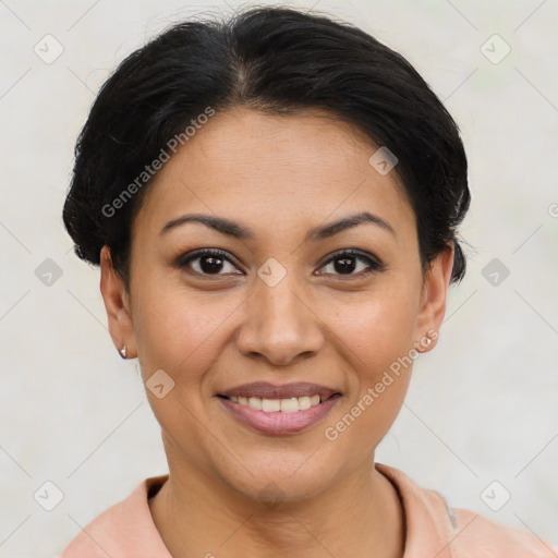 Joyful latino young-adult female with short  brown hair and brown eyes