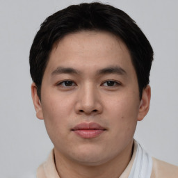 Neutral asian young-adult male with short  brown hair and brown eyes