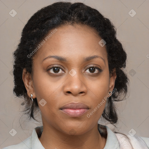 Joyful black young-adult female with medium  brown hair and brown eyes