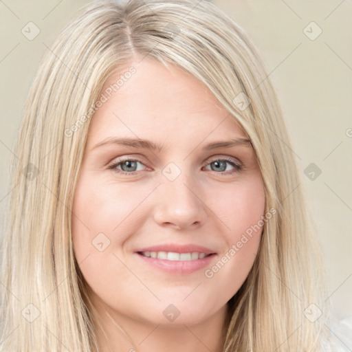 Joyful white young-adult female with long  brown hair and blue eyes