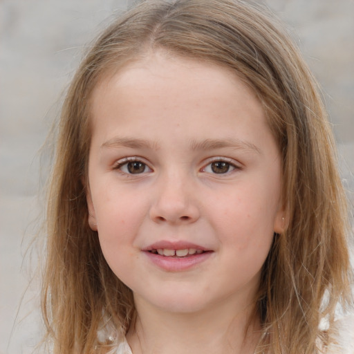 Joyful white child female with medium  brown hair and grey eyes