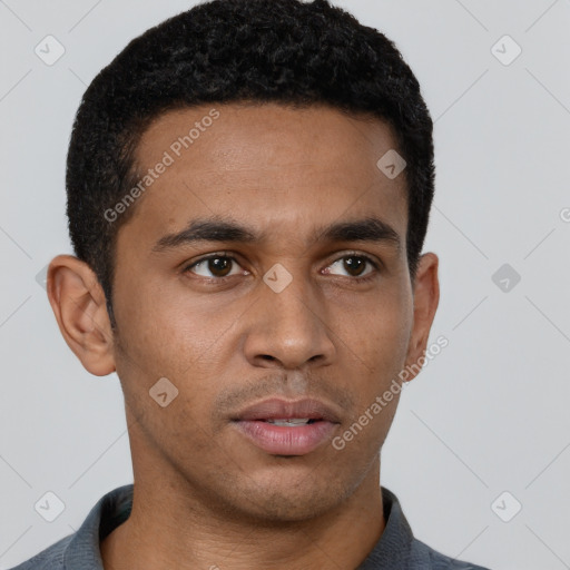 Neutral latino young-adult male with short  brown hair and brown eyes