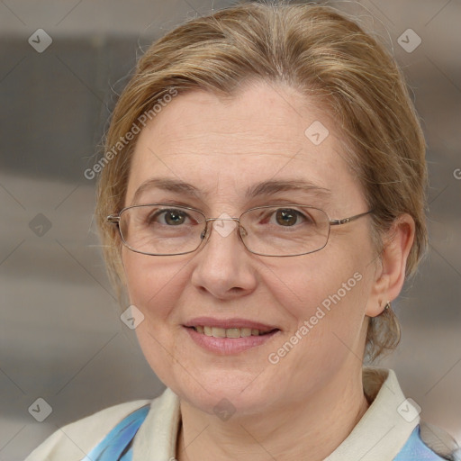 Joyful white adult female with medium  brown hair and blue eyes