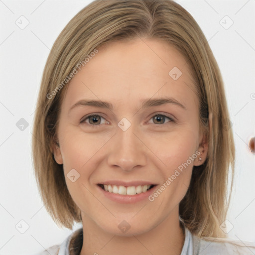 Joyful white young-adult female with medium  brown hair and grey eyes