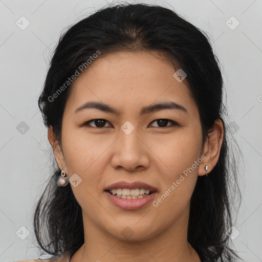 Joyful asian young-adult female with medium  brown hair and brown eyes