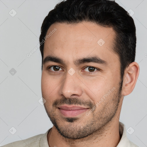 Joyful white young-adult male with short  brown hair and brown eyes