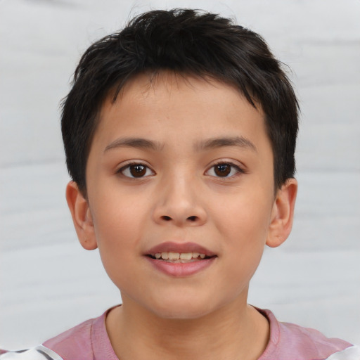 Joyful asian child female with short  brown hair and brown eyes