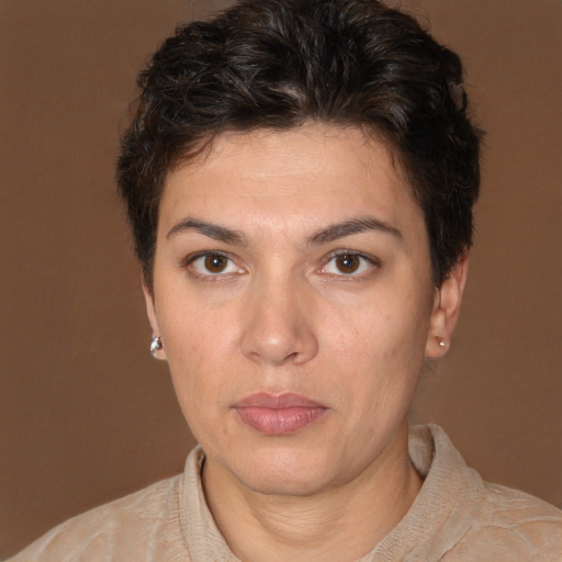Neutral white young-adult female with short  brown hair and brown eyes