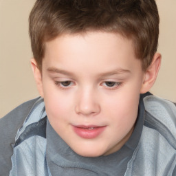 Joyful white child male with short  brown hair and brown eyes