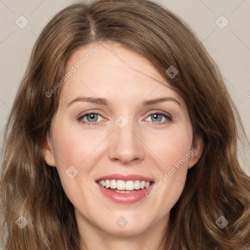 Joyful white young-adult female with long  brown hair and green eyes