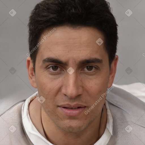 Joyful white adult male with short  brown hair and brown eyes
