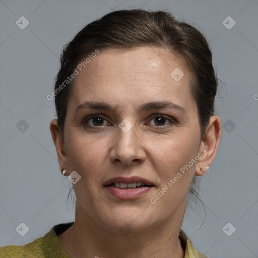 Joyful white adult female with short  brown hair and grey eyes